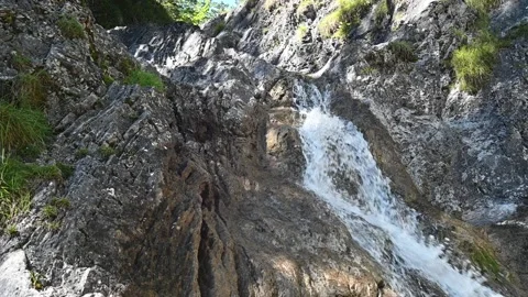 A waterfall from a mountain stream with rocks (slow motion) Stock-Footage 219646592