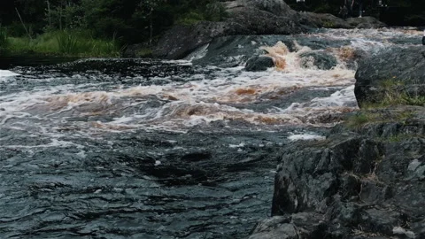 Waterfall on a mountainous stormy river Stockbeeldmateriaal 138803045