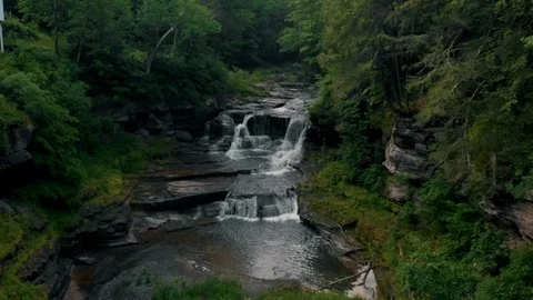Waterfall in mountains aerial Stock Footage 99690860