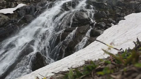 A waterfall in the mountains of the Central Caucasus Stock Footage 146689544