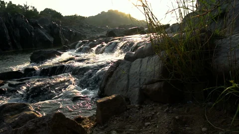 Waterfall in the mountains at evening Video stock 144088810