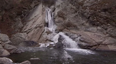 Waterfall in mountains. Stock Footage 50878432