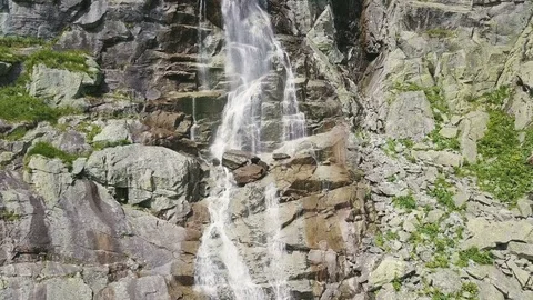 Waterfall in the  mountains Stockbeeldmateriaal 79193681