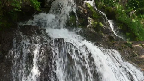 Waterfall in mountains Stock Footage 99860183