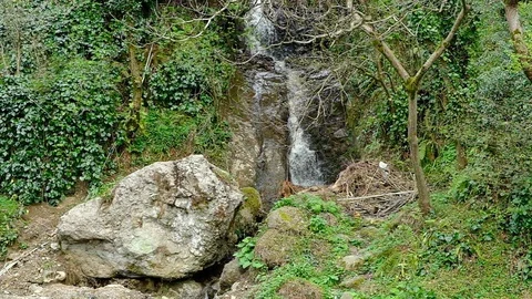 Waterfall in the mountains Stock Footage 128811902