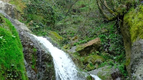 Waterfall in the mountains Stock Footage 128812352