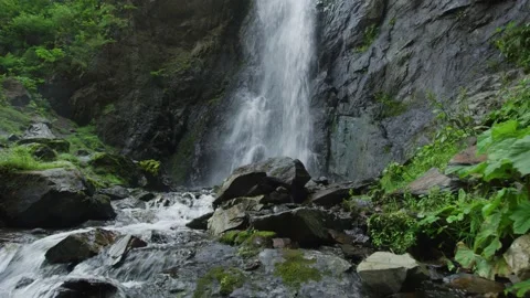 Waterfall in mountains Stock Footage 138138735