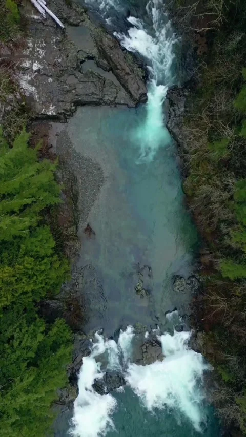 Waterfall in the mountains in forest Stock Footage 274044128