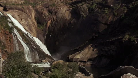 Waterfall in the mountains in a gorge in slow motion Stock Footage 159299396
