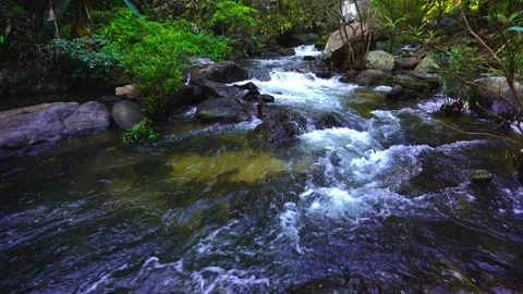 Waterfall in the mountains, Khlong Lan Waterfall, 動画素材 228948129