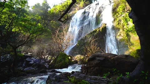 Waterfall in the mountains, Khlong Lan Waterfall, 動画素材 228948504