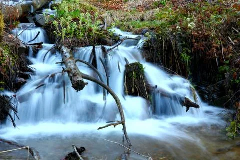 Waterfall in the mountains Stock Photos
