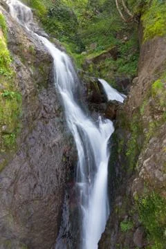 Waterfall in the  mountains Stock Photos