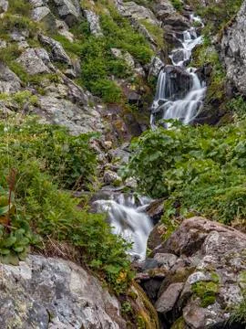 Waterfall in the mountains Stock Photos