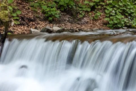 Waterfall in mountains Stock Photos