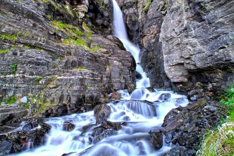 Waterfall in the mountains Stock Photos