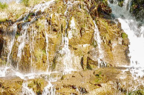 Waterfall in the mountains Stock Photos