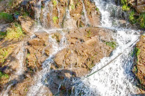 Waterfall in the mountains Stock Photos