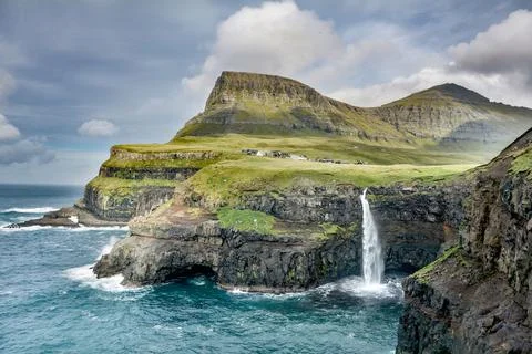 Waterfall in the mountains Stock Photos