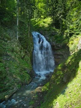 Waterfall in the Mountains Stock Photos