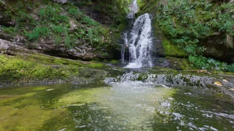 Waterfall in the mountains. River in the forest with cascading waterfalls Video stock 207474839