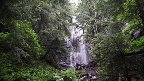 Waterfall in the mountains rock trees Stock Footage 137919255