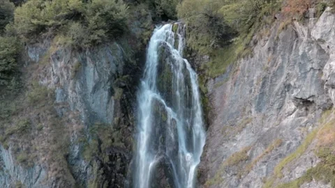 Waterfall in the mountains in a rock wall Video stock 138901692
