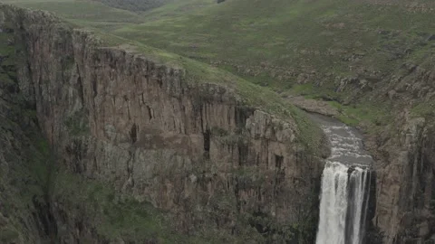 Waterfall In The Mountains Seen By Drone Video stock 201589357