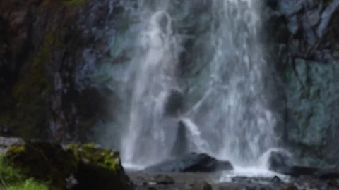 Waterfall in the mountains. Slow motion. Stock Footage 79890912