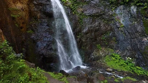 Waterfall in the mountains. Slow motion. Video stock 79891018