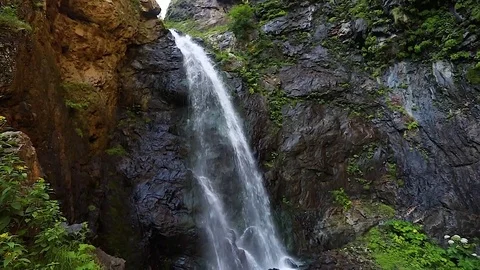 Waterfall in the mountains. Slow motion. Stock Footage 79891044