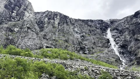 Waterfall in the mountains of Trollstigen Stock Footage 317246281