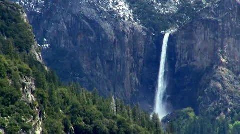 Waterfall in the mountains zoom out Stock Footage