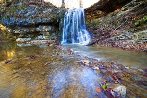 Waterfall at the mountais Stock Photos