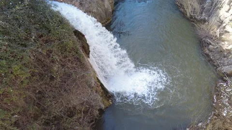 The waterfall in the national park flows into the river. Stock Footage 229824445