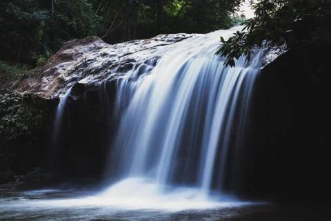 A waterfall in the natural forest Stock Photos
