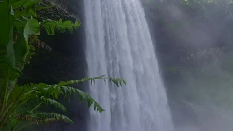 Waterfall in a natural rainforest in Laos Stock Footage 248575294