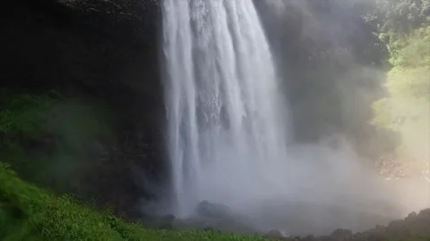 Waterfall in a natural rainforest in Laos Stock Footage 248575503