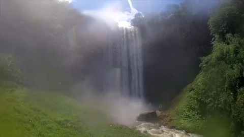 Waterfall in a natural rainforest in Laos Stock Footage 248575598