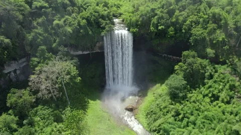 Waterfall in a natural rainforest in Laos Stock Footage 248596887