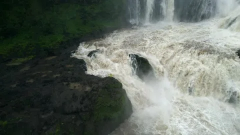 Waterfall in a natural rainforest in Laos Stock Footage 248660879