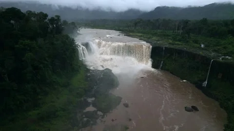 Waterfall in a natural rainforest in Laos Stock Footage 248660922
