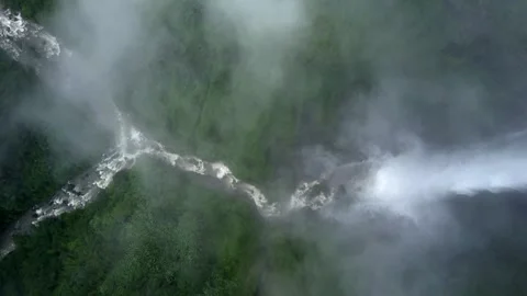 Waterfall in a natural rainforest in Laos Stock Footage 248660932