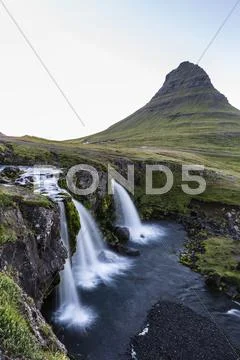 Waterfall near Kirkjufell (Church Mountain), just outside the town of Stock Photos
