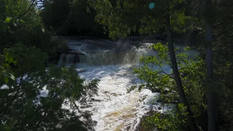 Waterfall in Northern Michigan; high angle through trees Stockbeeldmateriaal 166184022
