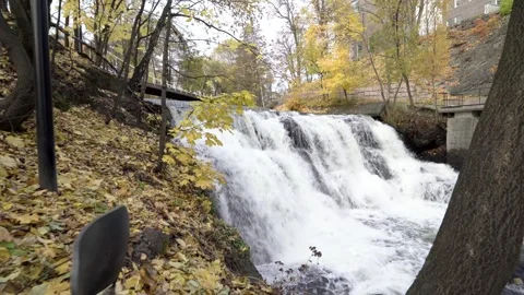 Waterfall in Oslo center during fall with old chair Stock Footage 264611402