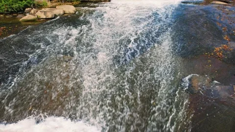 Waterfall Over Low Rocks Background 4K Loop Stock Footage 229509480