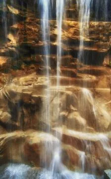 Waterfall over rocks Stock Photos