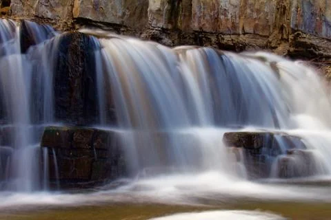 Waterfall over Rocky Ledge Фото