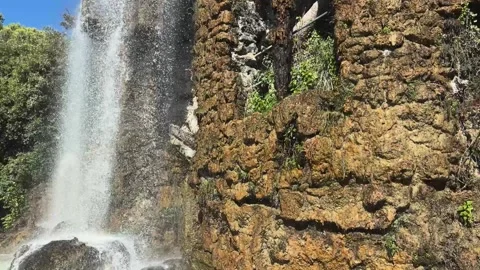 Waterfall at Parc de la Colline du Château in Nice, France 動画素材 344052732